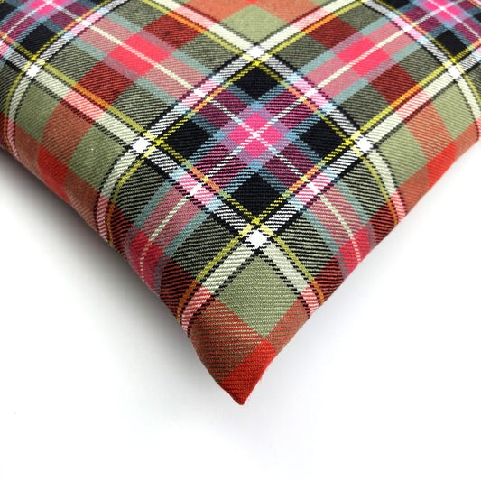 Bruce of Kinnaird Ancient Tartan Cushion, corner close-up, turned slightly on white