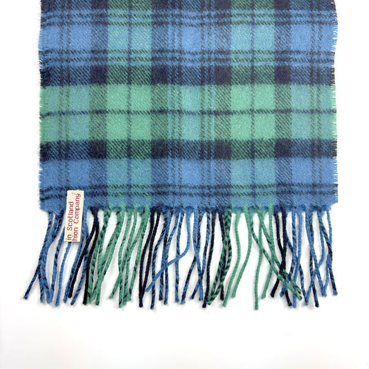 Campbell Ancient Tartan Scarf, end close-up on white, fringed hem and label