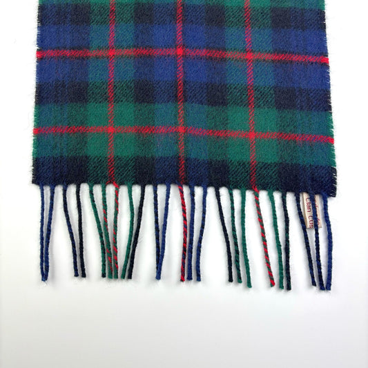Murray of Atholl Modern Tartan Scarf, close-up of fringe on white, small label