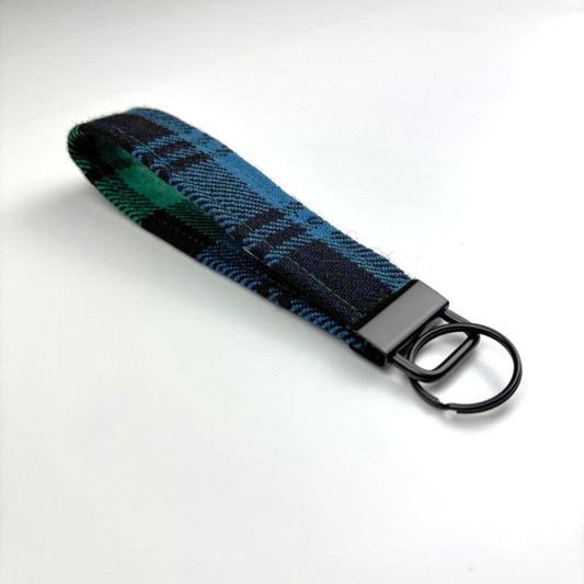 Black Watch Ancient Tartan Keyring, angled on white, black ring and hardware