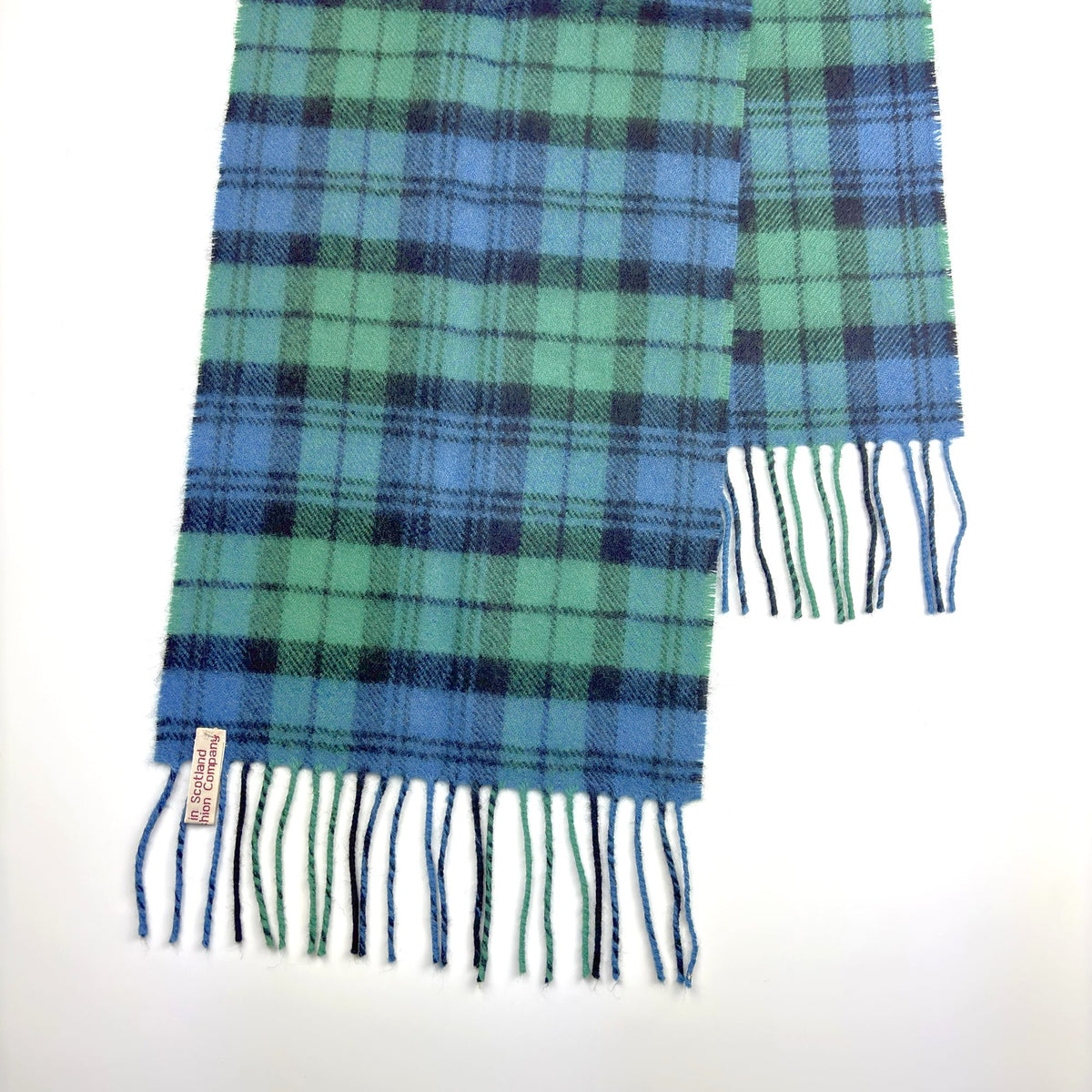 Campbell Ancient Tartan Scarf, end on white, fringed, label visible