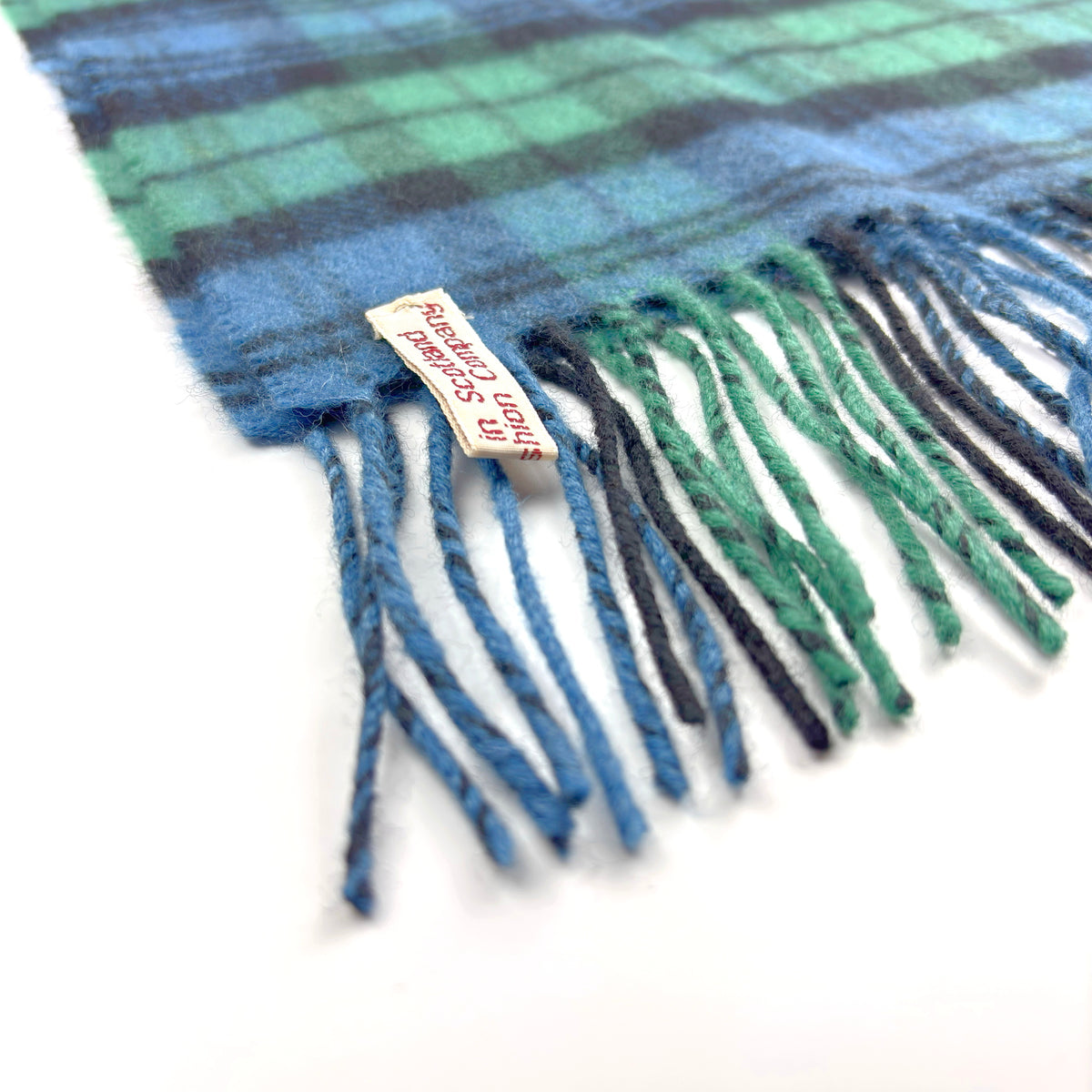 Campbell Ancient Tartan Scarf, fringe corner on white, small label visible