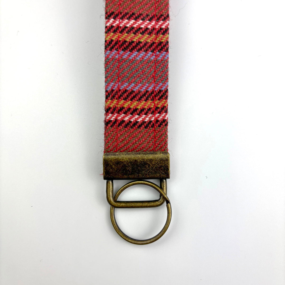MacLean of Duart Weathered Tartan Keyring, close-up of brown tab and antique brass ring