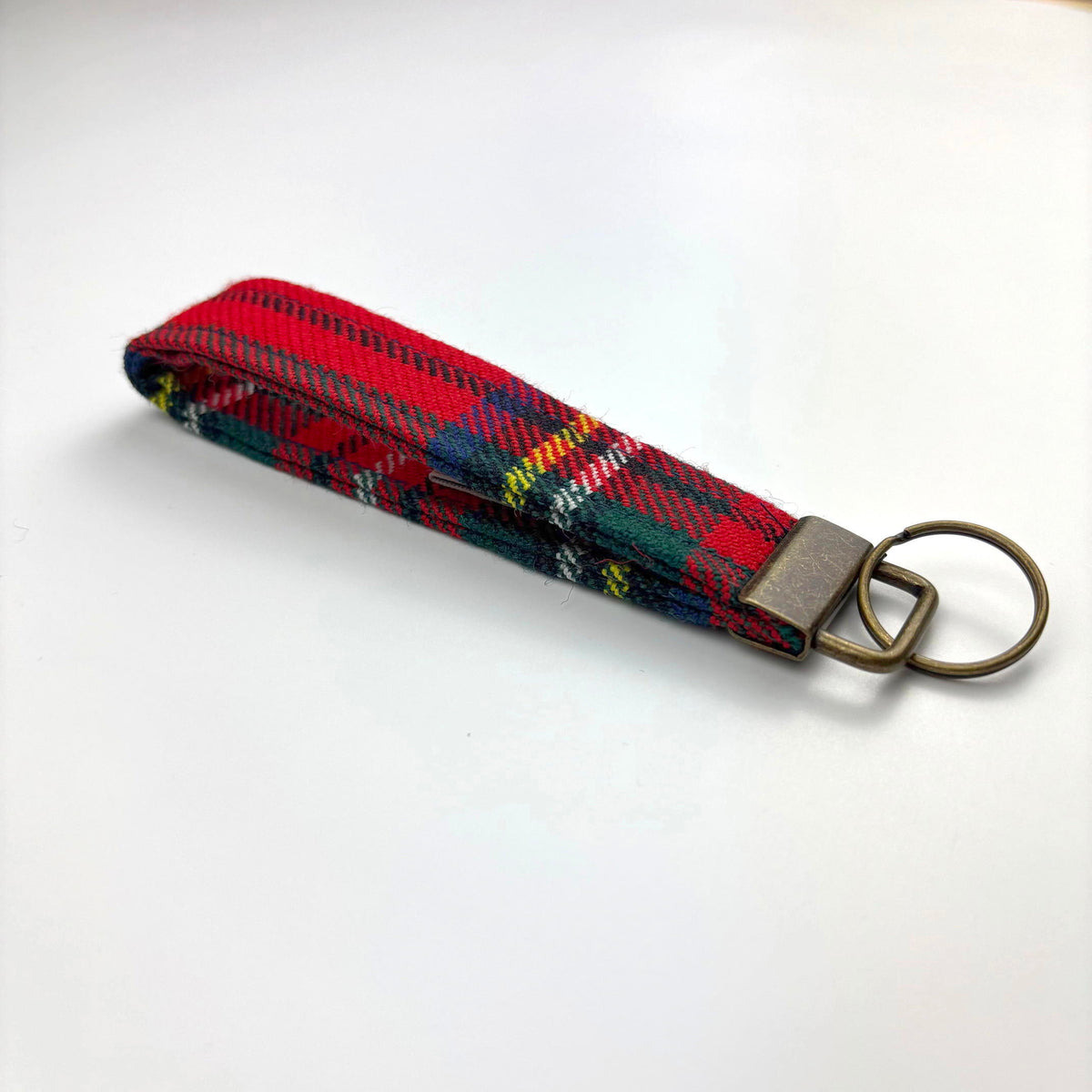 Stewart Royal Modern Tartan Keyring, angled on white, brass tab and ring